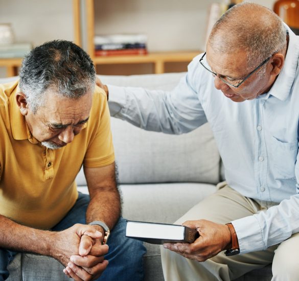Men, home and bible with prayer for faith, jesus and worship, pastor and church with counselling. E.